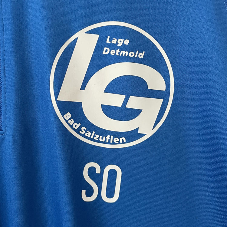 die Bedruckung des Lauf Verein Logo auf den Running Tops