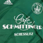 Die Trikot Bedruckung mit dem Cafe Logo